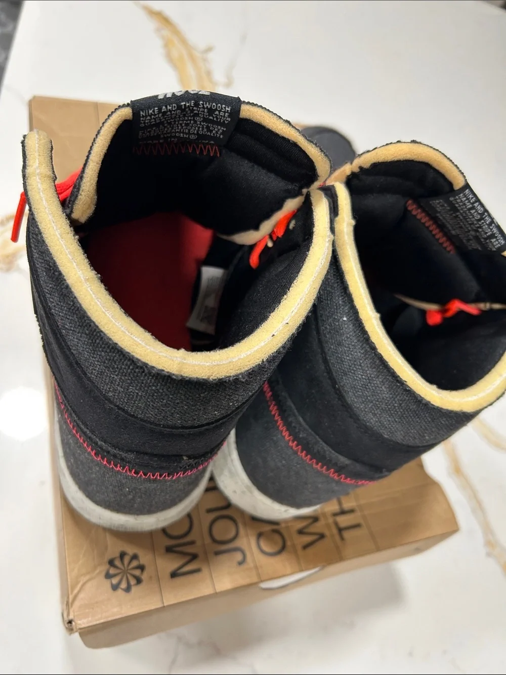 Nike Black High-Top Sneakers with Bright Red Laces